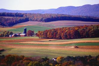 farmland, farm buildings, and crops