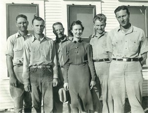 Thumbnail for the first (or only) page of Edward F. Knipling early employment. From left: Charles Hall, Billy Ellis, Parish, Miss Nash, Bushland, and Knipling..