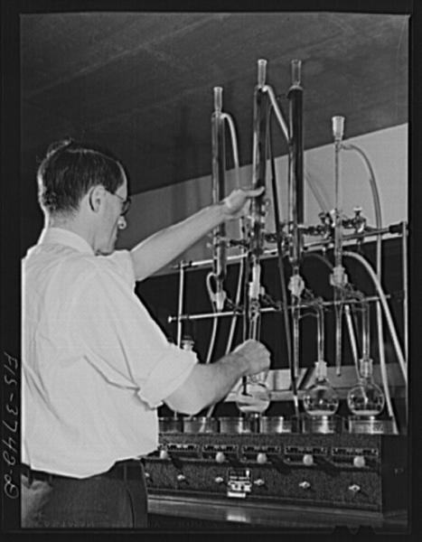 L.R. Leinbach, associate chemist, assembles the apparatus used in determining moisture content of dehydrated vegetables at the regional agricultural research laboratory. Albany, Ca