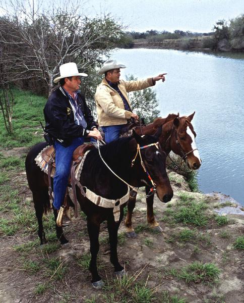 Two men on horseback